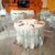 acrylic chairs with round table + white covers (1).jpg
