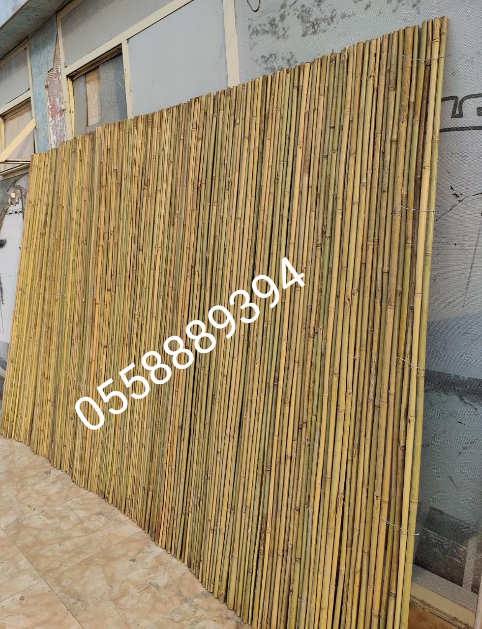 Bamboo poles and Thicker bamboo Fence